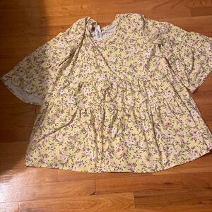 NWT Women’s Spin top. Yellow with pink/purple design. Side 1x